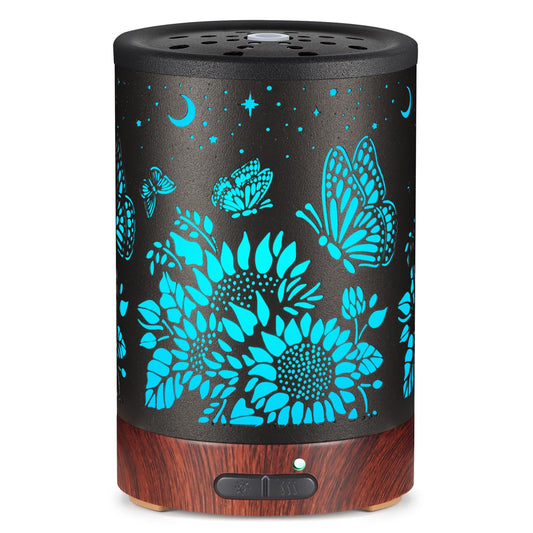 Essential oil diffuser with sunflower and butterfly motif - front view