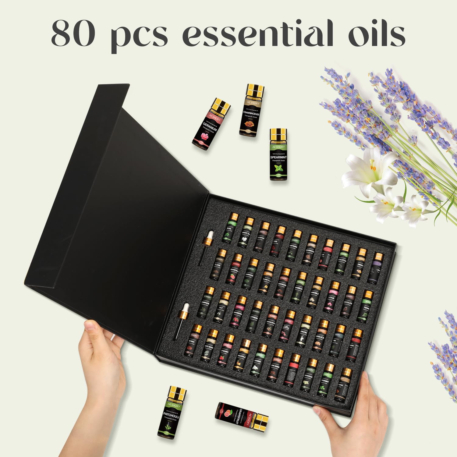 Close-up of amber glass essential oil bottles with droppers