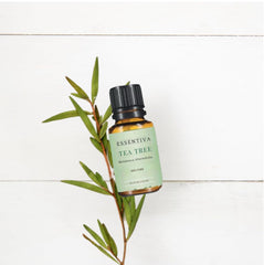 Essentiva Tea Tree Oil leaves and bottle convey a natural, fresh aroma routine.