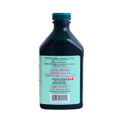 Dark tinted Essiac bottle with label and cap