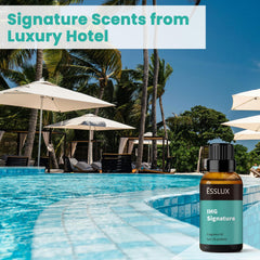 Close-up of ESSLUX IHG Signature fragrance oil bottle