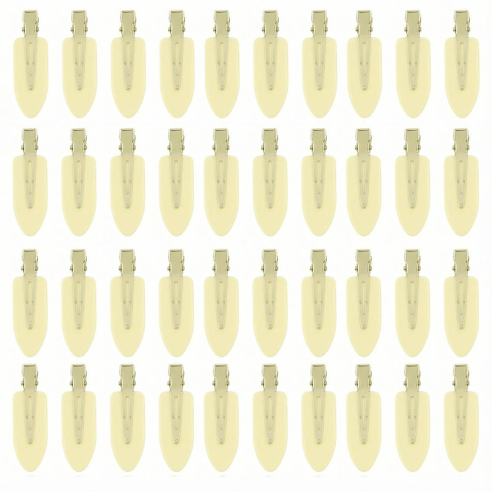 Eswala no-crease hair clips in beige for makeup application and tidy bangs.