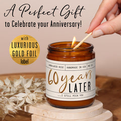 Candle with etched gold-foil message '60 Year Later'