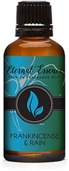Amber glass 30ml bottle of Eternal Essence Oils Frankincense & Rain fragrance oil with black cap