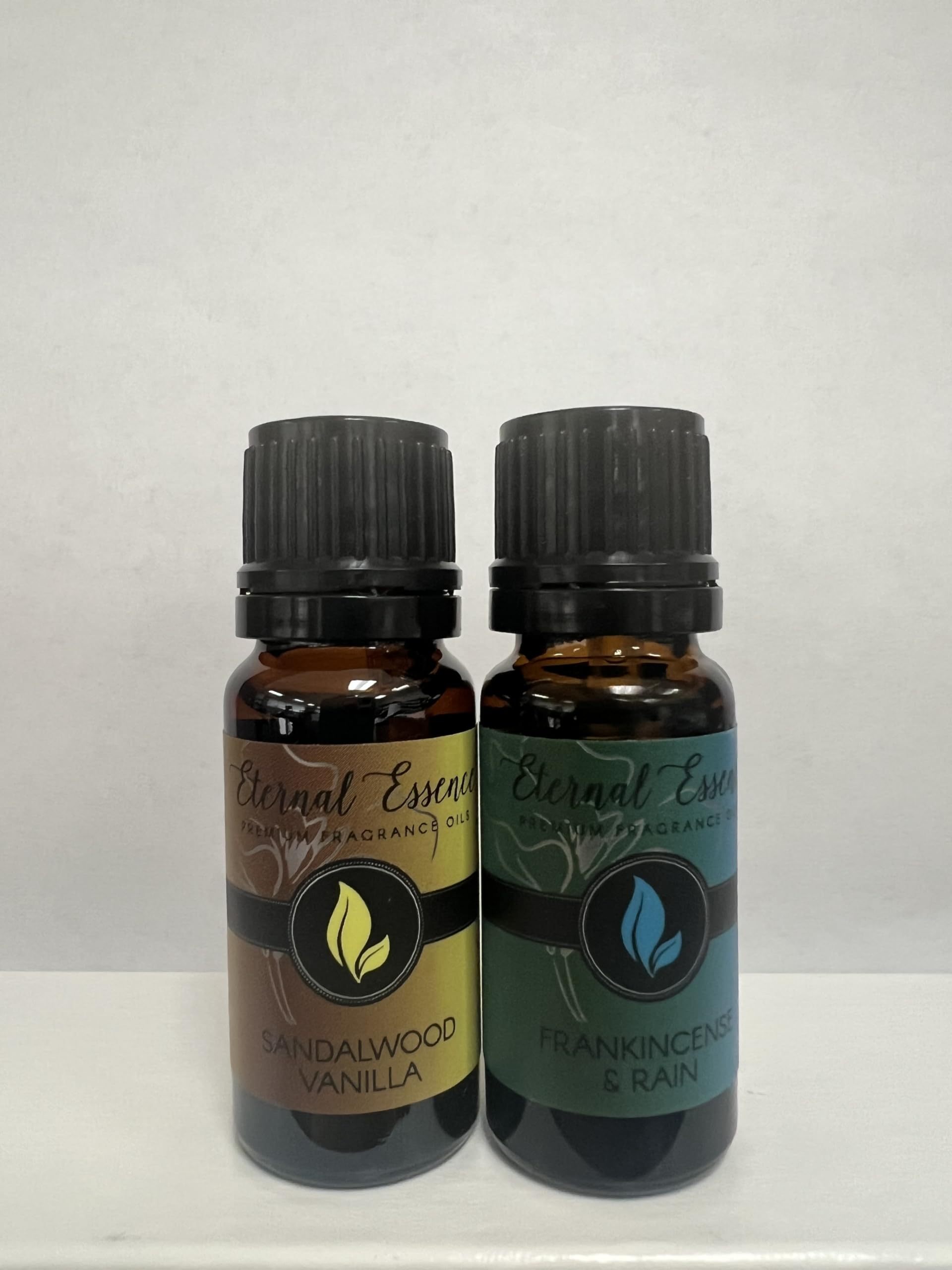 Pair of 10ml fragrance oil bottles on a white background