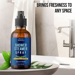 Shower steamer spray being used in a steam shower
