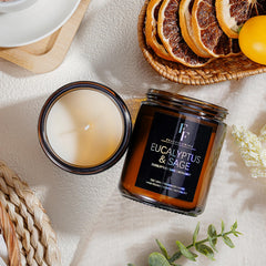 Lit amber jar candle creating a relaxing atmosphere
