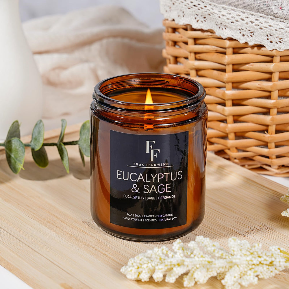 Relaxing setup with Eucalyptus & Sage candle and greenery