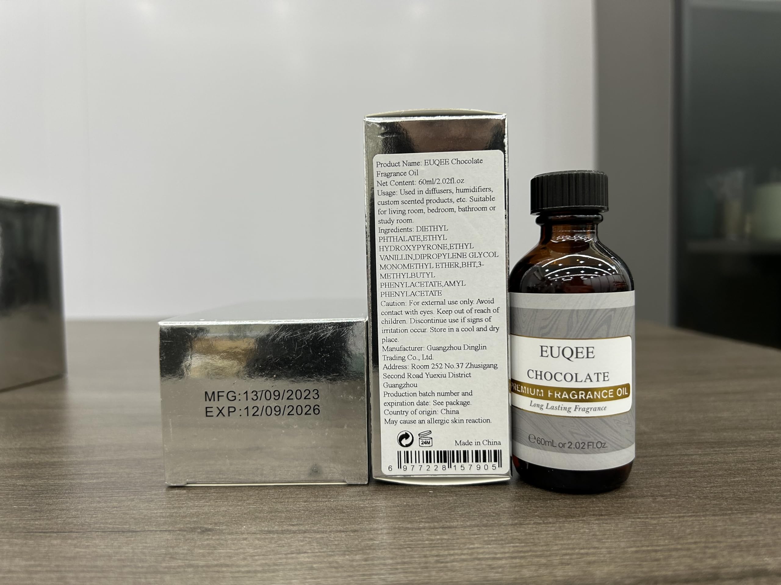 EUQEE Chocolate Fragrance Oil shown with bath bombs and soaps