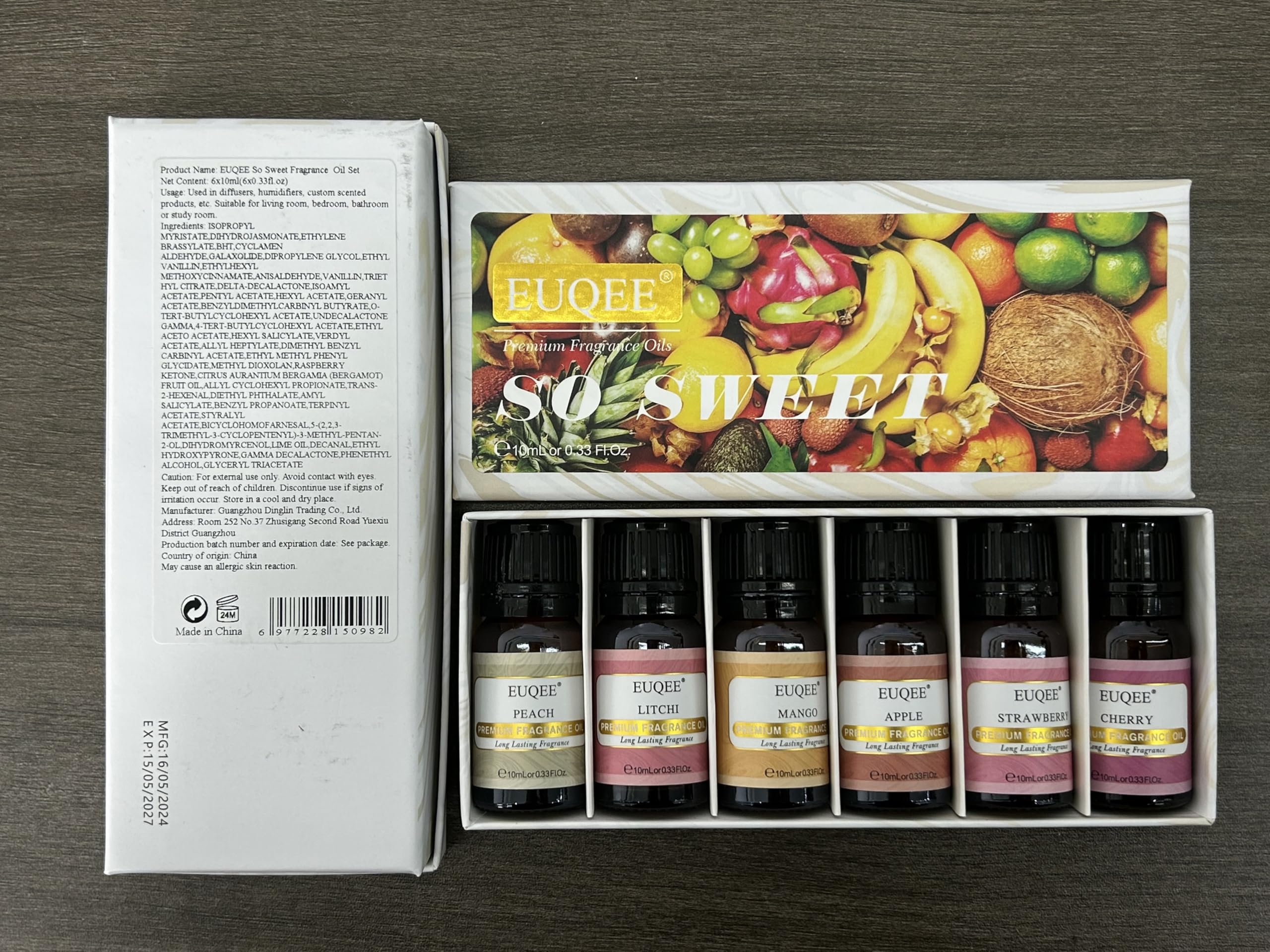 EUQEE gift box open displaying all six bottles, ready for gifting to crafters