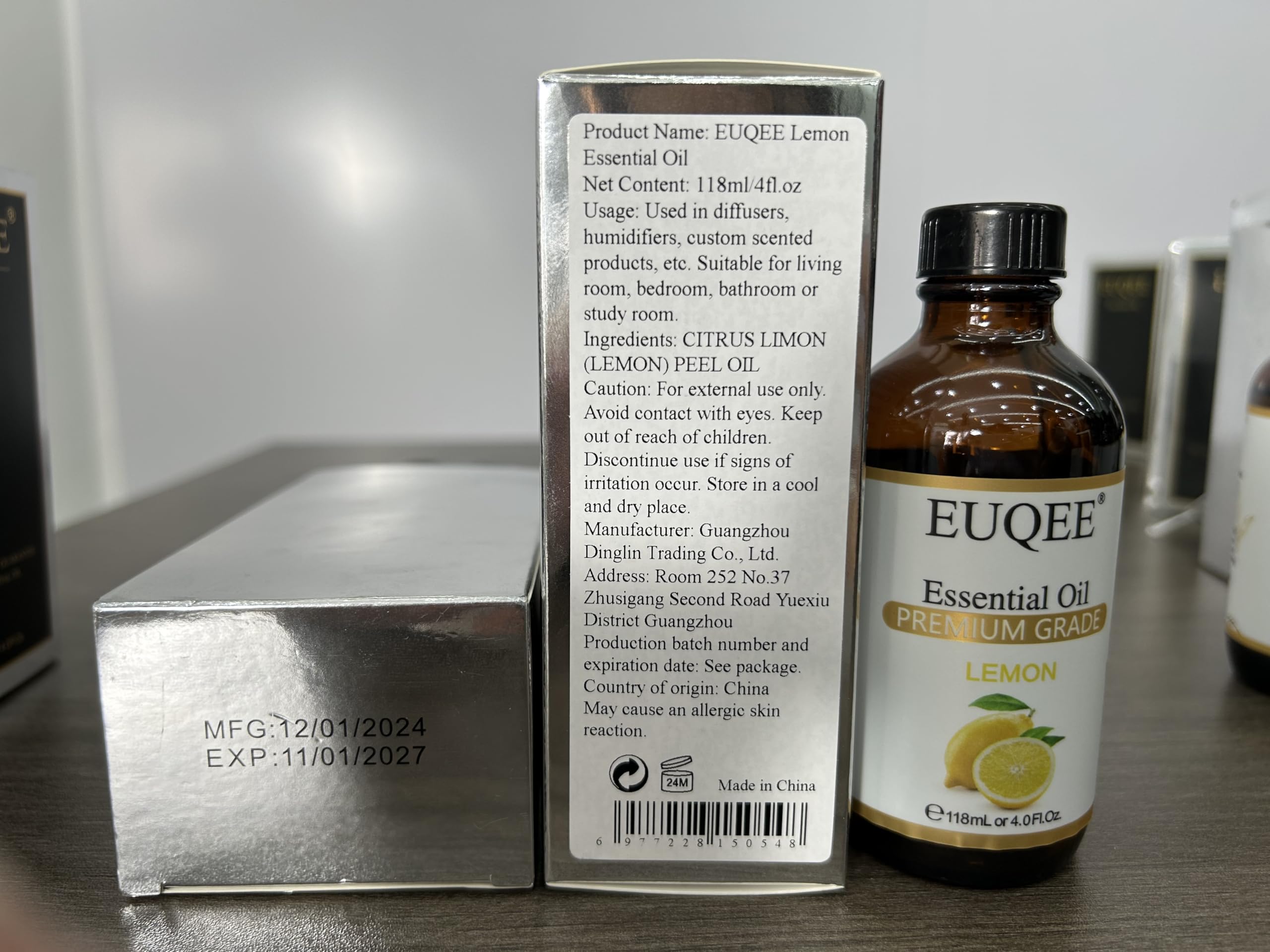 Close-up of EUQEE Lemon Essential Oil label
