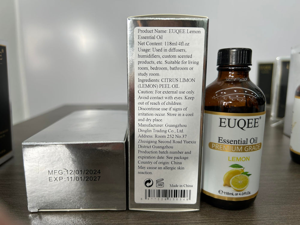 Close-up of EUQEE Lemon Essential Oil label