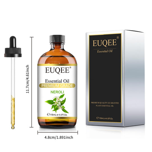 Amber glass bottle of Neroli essential oil with dropper close-up
