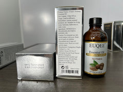 Side view of EUQEE Nutmeg Essential Oil bottle