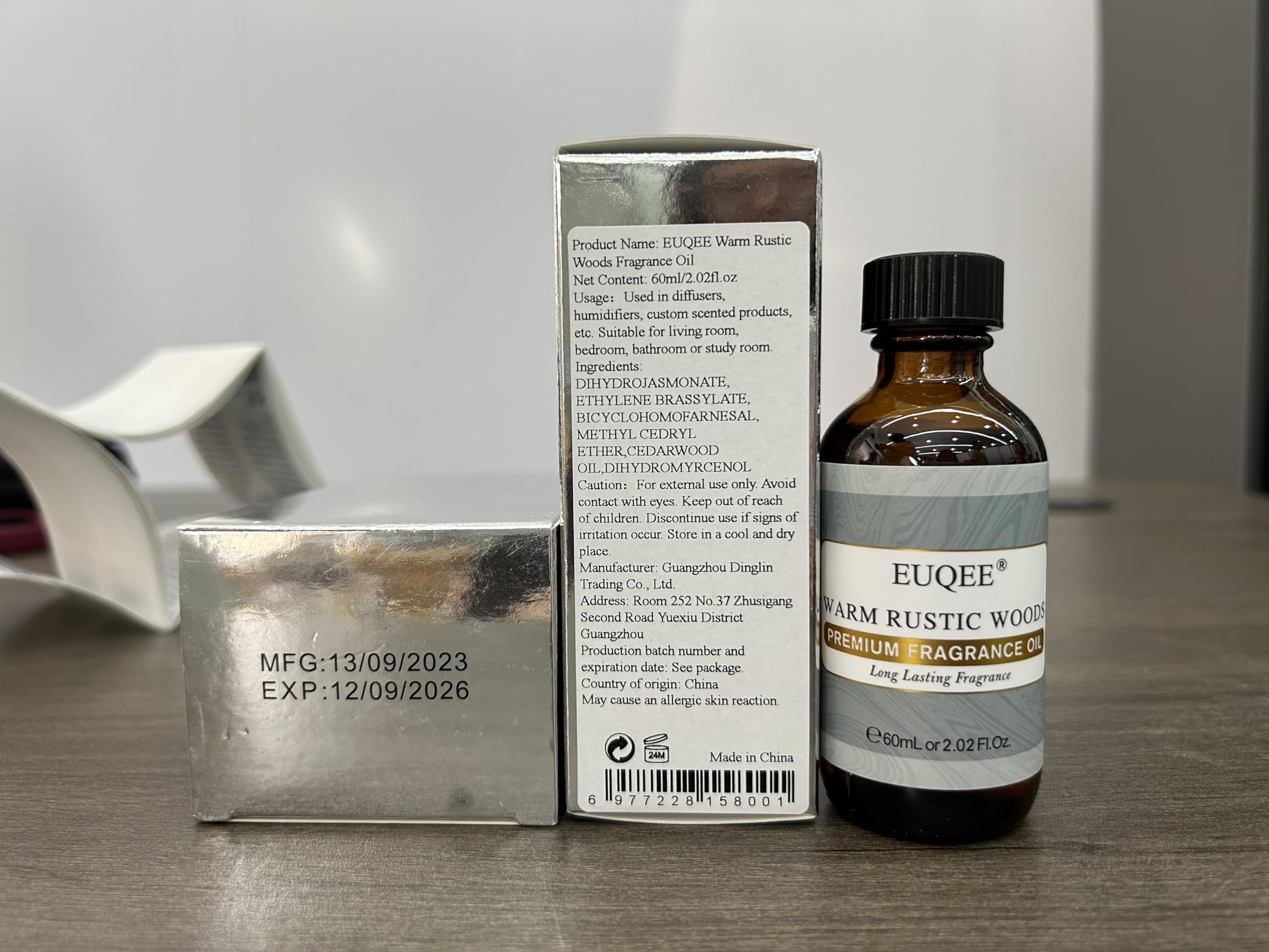 Gift box packaging for EUQEE Warm Rustic Woods fragrance oil