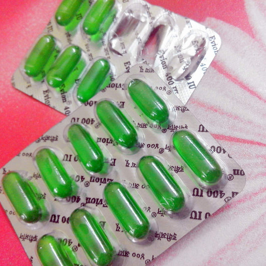 Close-up of Evion Vitamin E capsules for skin and hair care
