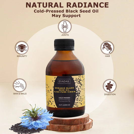Close-up of EYADAS Black Seed Oil bottle in amber glass