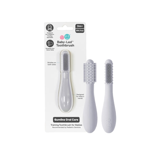 ezpz Baby-Led Toothbrush in Blush color with sensory bumps and non-slip grip