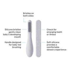 Angle view of ezpz Pewter Baby-Led Toothbrush