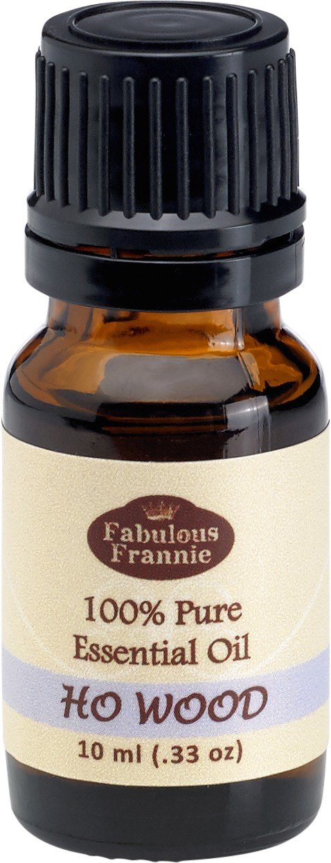 Fabulous Frannie Ho Wood essential oil bottle in amber glass ideal for diffusing aroma.