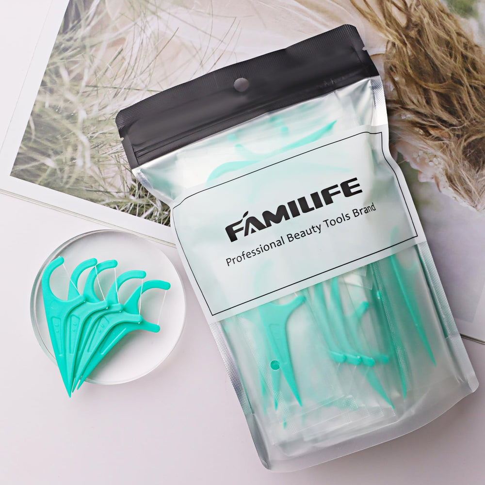 Floss picks cleaning between teeth and removing debris