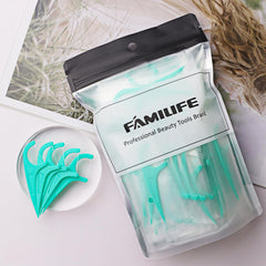 Floss picks cleaning between teeth and removing debris