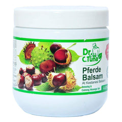 Applying Pferde Balsam massage balm on skin for relaxation
