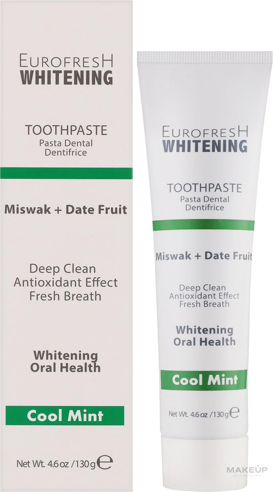Toothpaste being dispensed onto a toothbrush