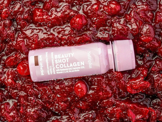Single cranberry-flavored beauty shot bottle