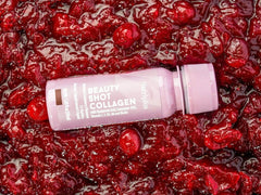 Single cranberry-flavored beauty shot bottle