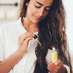 FEIBTH scalp hydration moment shows massage-ready oil for comfort.