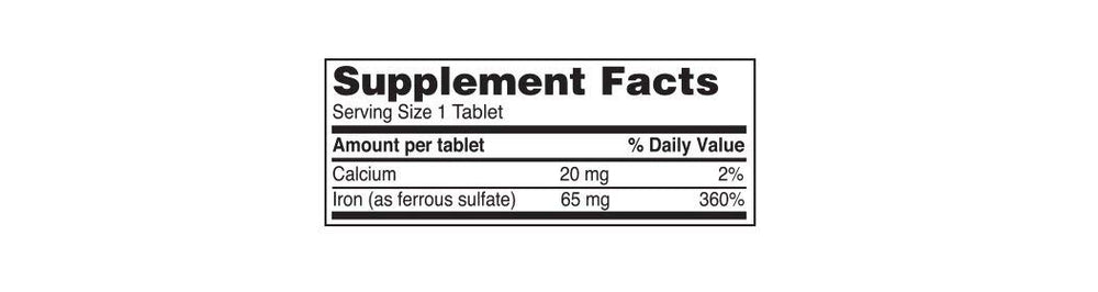 Close-up of an iron tablet showing 65 mg elemental iron