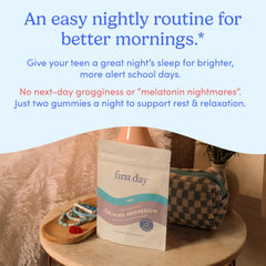 First Day Teens’ Nighttime Reset vegan formula bottle sits on a nightstand.
