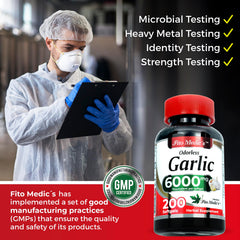 Lifestyle image of a person taking a garlic supplement