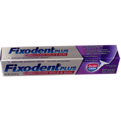 Packaging and 2 oz tube of Fixodent Plus Denture Adhesive Cream