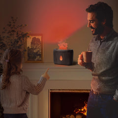 Close-up of flame diffuser displaying mist and warm glow