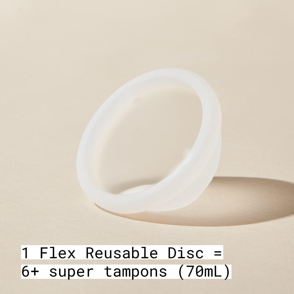 FLEX wash foaming cleanser bottle beside disc for gentle, skin-friendly cleaning