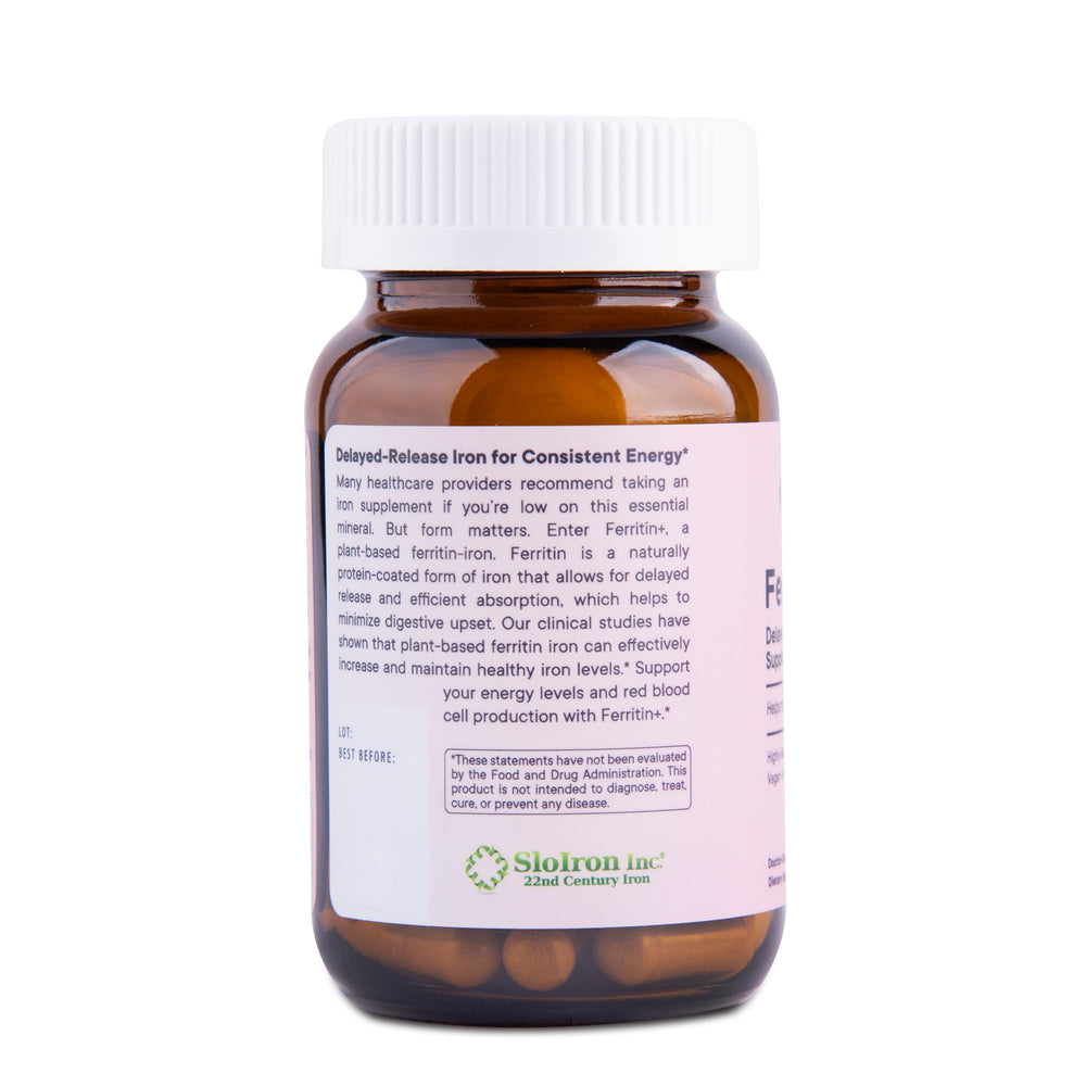 Close-up of Flora Ferritin+ capsules highlighting plant-based iron formulation.
