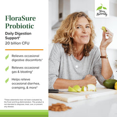FloraSure Probiotic capsules spilling next to bottle