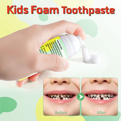 Strawberry flavored kids toothpaste foam tubes on table
