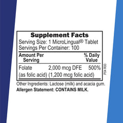Close-up of dissolving folic acid tablet