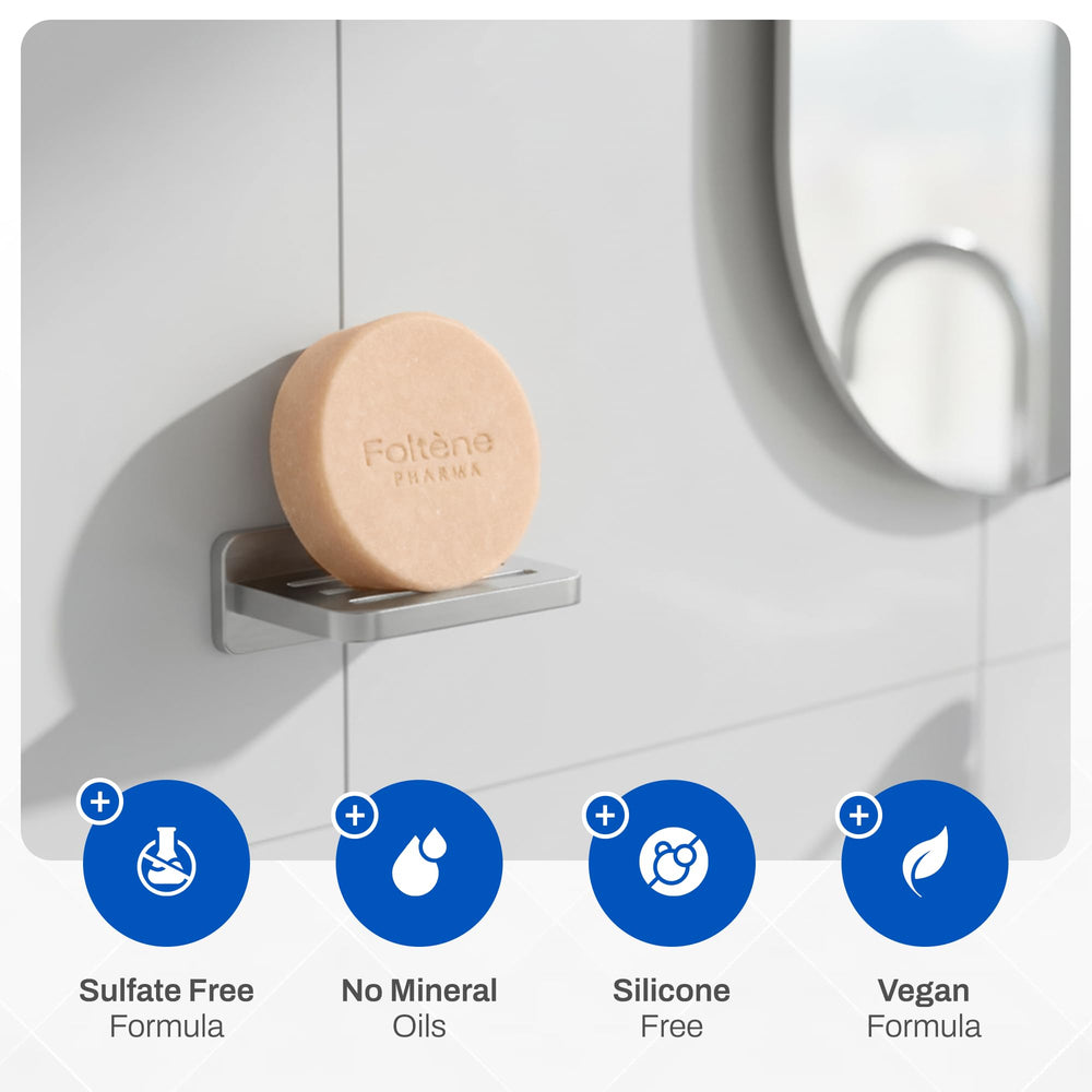 Travel-ready Foltene shampoo bar in compact packaging for on-the-go cleansing.