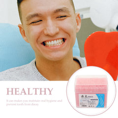 Disposable floss pick close-up double-ended design