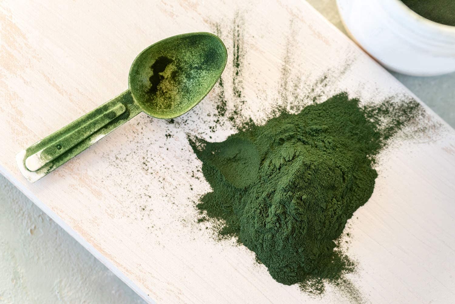 Chlorella powder sprinkled on a salad