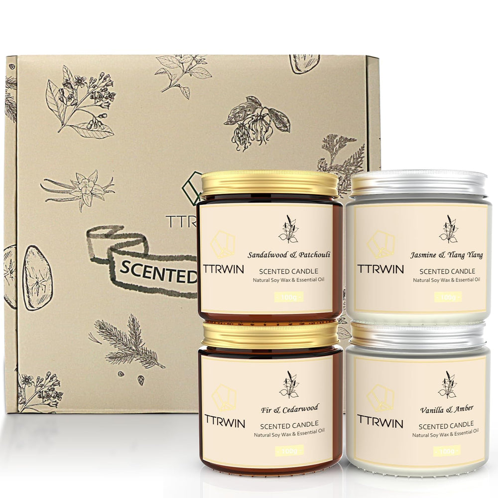 Four-pack scented candles set in jars for home decoration (hero image)