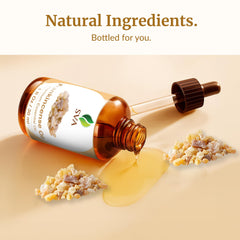 Close-up of frankincense essential oil bottle