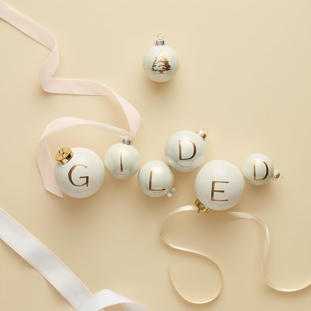 Gift-ready presentation of the Frasier Fir candle with gilded accents