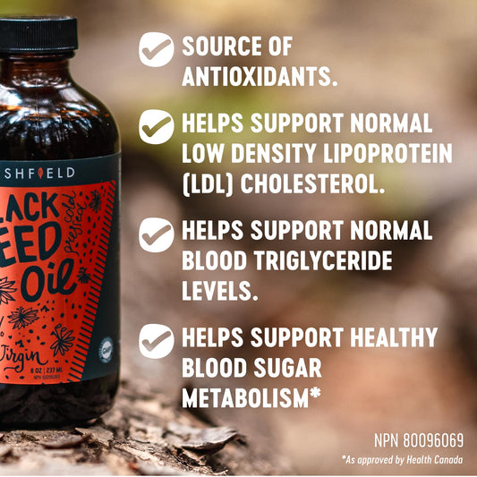 Glass bottle of Freshfield Black Seed Oil with label visible