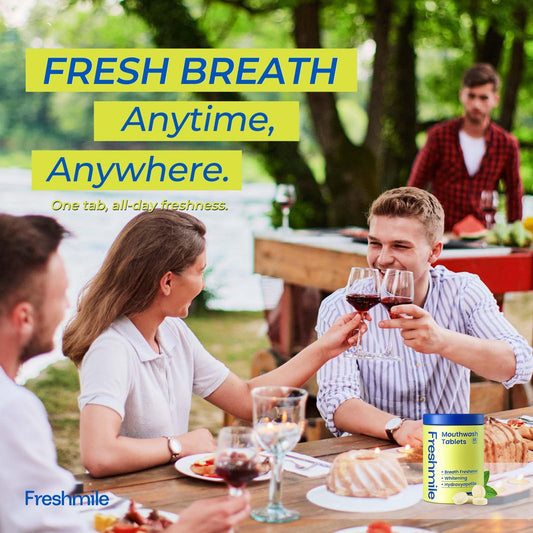 Hands holding Freshmile travel mouthwash tablets for on-the-go use