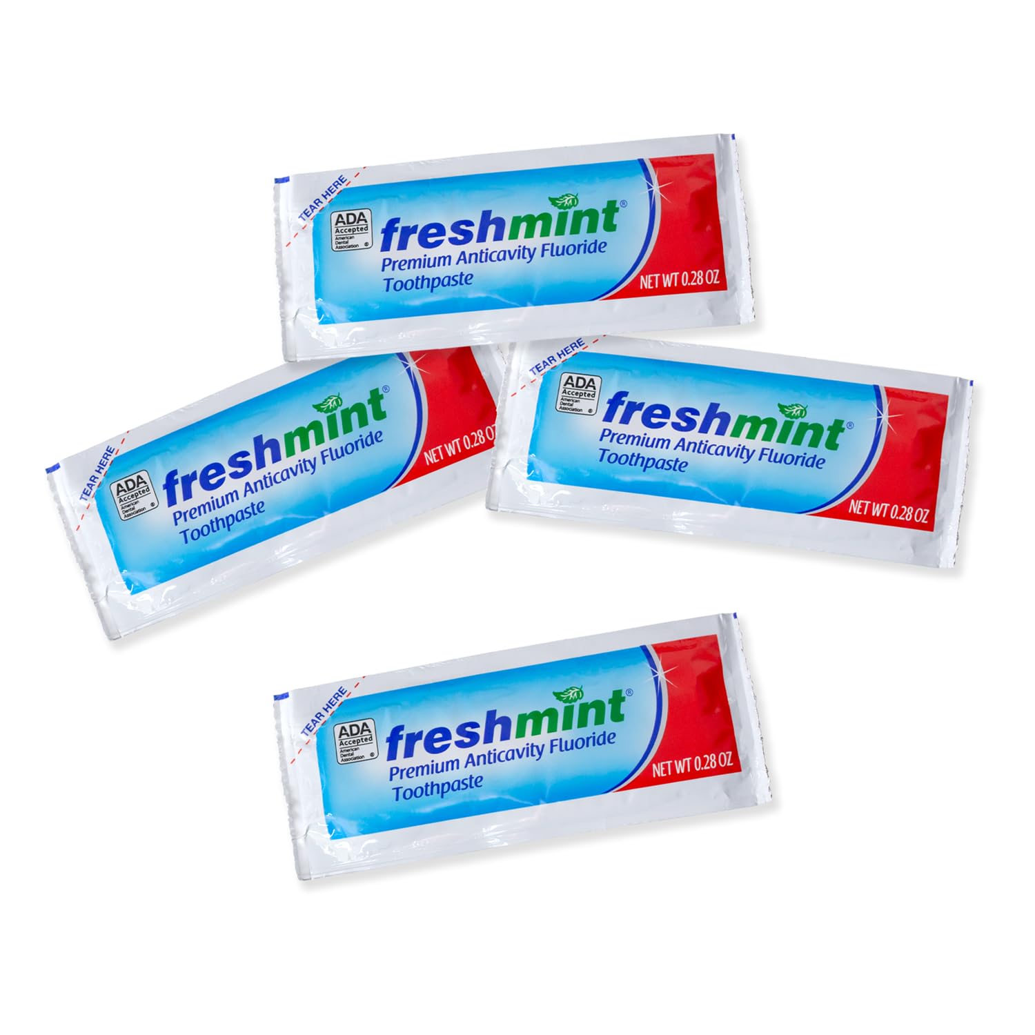 Close-up of Freshmint toothpaste packets showing mint flavor and light blue color